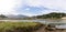 View of the estuary of the Sella River in Asturias at low tide with old row boat wrecks