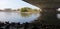 view of the estuary under the bridge at low tide.  bring coolness and serenity.