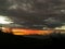 View of evening dark colorful sunset with clouds in hilly area of Himachal pradesh, India