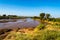 View of the Ewaso Ng`iro River in the savannah of Samburu Park