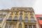 View of the exterior facade of a classic building, sky as background, in Coimbra city, Portugal