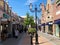 View on exterior shopping street in summer with blue sky