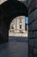 View of the facade of an ancient stone church through a passage. Cathedral of Lugo in Galicia, Spain