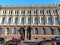 View of the facade of the building with bas-reliefs and statues of angels