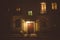 View of the facade of a residential apartment building in the evening, the light in the windows