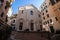 View of facade of Santa Maria di Castello church in old city centre of Genoa, Italy.