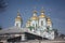 View of the facade of the temple with domes