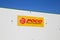View on facade with yellow logo of Poco furniture discount store against blue sky