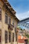 View of facades, alleyway and traditional houses in Porto