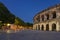 View of famous amphitheater by night, Nimes
