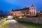 View on famous benedictine monastery of Broumov and the broumov walls in the background. Broumov, Hradec Kralove, Czech Republic.