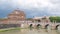 View on famous Saint Angel castle timelapse and bridge over the Tiber river in Rome, Italy.
