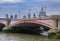 View of the famous St. Paul\'s Cathedral across the river Thames with 18th century Blackfriars Bridge in London, England