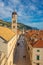 View of the famous Stradun street in the old town of Dubrovnik, as seen from above while climbing the city walls. Long narrow