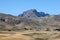 A view of farm land sitting below barren mountains at Cavustepe in eastern Turkiye.