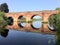 A view of Farndon Bridge with reflection
