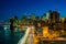 View of FDR Drive and the Lower Manhattan skyline at night, from the Manhattan Bridge Walkway, New York