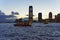 View on Ferry and Jersey City skyline in the evening