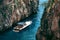 A view of the Fiordo of Furore in Amalfi coast, Travel and vacation concept, yacht with tourists for excursionsItaly. Watercraft