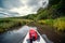View from the first person. A trip on a SAP board. A narrow river in the middle of the forest, Summer day. Waterproof bag. Tours