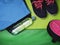 View of Fitness and sport equipment. Healthy lifestyle concept. Sneakers, sportswear, on green mat background, top view