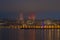 View of the Flame Towers and the city embankment on a foggy winter evening