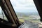 View from a flight deck window on a runway, just before landing