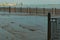 View from the flooded embankment to the cargo river port on the Amur River in Blagoveshchensk, Russia.