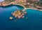 View from flying drone. Aerial morning view of Bella island. Incredible spring seascape of Mediterranean sea, Mazzaro` town, Sici