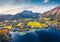 View from flying drone. Awesome autumn scene of Altausseer lake. evening landscape of Austrian Alps. Breathtaking autumn view of A