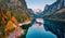 View from flying drone. Captivating autumn view of Gosausee Vorderer lake with Dachstein glacieron background. Spectacular eveni