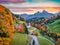 View from flying drone Maria Gern church with Hochkalter peak on background. Fantastic autumn sunrise in of Bavaria Alps. Fantasti