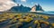 View from flying drone. Spectacular autumn scene of Stokksnes cape with Vestrahorn Batman Mountain on background. Panoramic Icel