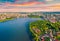 View from flying drone of Ternopil lake. Splendid summer sunset on Seret river.