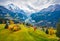 View from flying drone of Wengen village, district of Lauterbrunnen. Gloomy morning scene of Swiss Alps. Dramatic autumn landscape