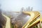 View in Fog of the Golden Bridge on Ba Na Hills in Da Nang on rainy day