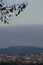 View of fog lies over the skyline of a city in the morning