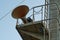 View on foghorn attached in platform of forward vessel mast with ladder from mooring station.