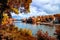 View through foliage to Nidelva river, Trondheim city, Norway