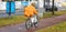 View of a food delivery man riding a bicycle, Rotterdam Netherlands