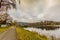 View of a footpath next to the Doyards Lake with his gazebo in the middle of the lake