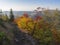 View from footpath on top of Klic or Kleis in Lusatian Mountains or luzicke hory with vivid autumn colored deciduous and