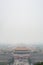 View of the Forbidden City through the air pollution, Beijing. Taken from the top of the hill in Jingshan Park.