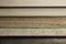 View on fore edge of isolated stacked old yellowed books with copy space for text