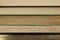 View on fore edge of isolated stacked old yellowed books with copy space for text