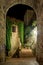 View of a foreshortening through an arch in San Gimignano in Tuscany by night