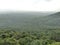 The view of a forest and green plants lakes and rain bearing clouds in monsoon season from a mountain.
