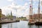 View of  the former stock exchange `Borsen` and Christiansborg Palace from Christianshavn side of Copenhagen inner canal.