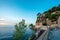 View on Fort Antoine Ian Theatre and Pescher tunnel  and Mediterranean Sea. Idyllic pine trees on rock in morning of summer on