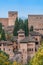 View of fortified buildings of Alhambra palace complex and Albaicin district from Jardines del Generalife gardens